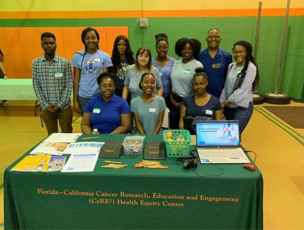 CaRE2 Summer Undergraduate Trainees assisting with CaRE2 sponsored community events with Dr. Suthers and Dr. Redda at FAMU